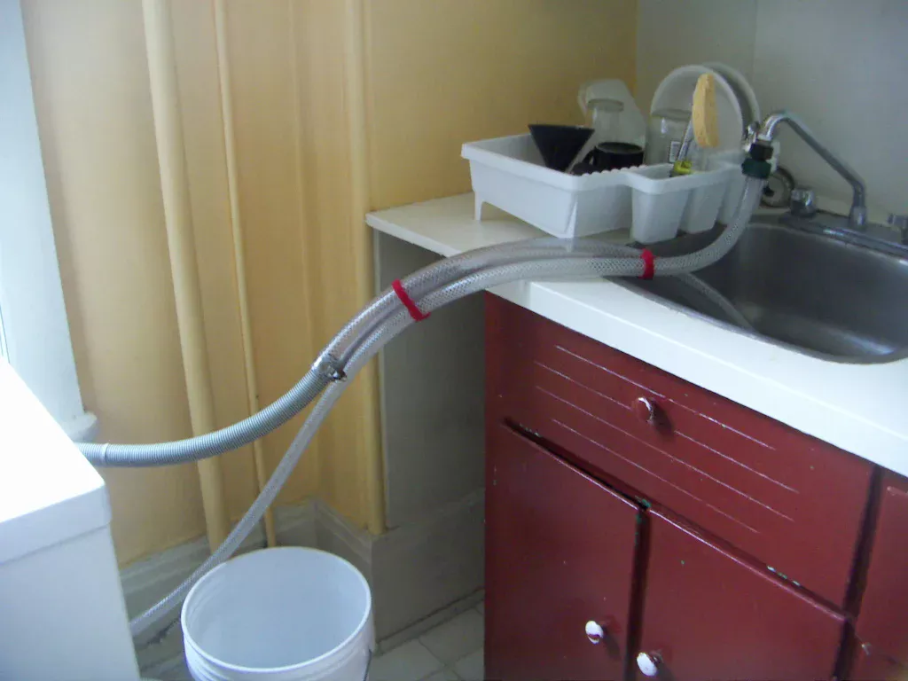Як підключити пральну машину до умивальника